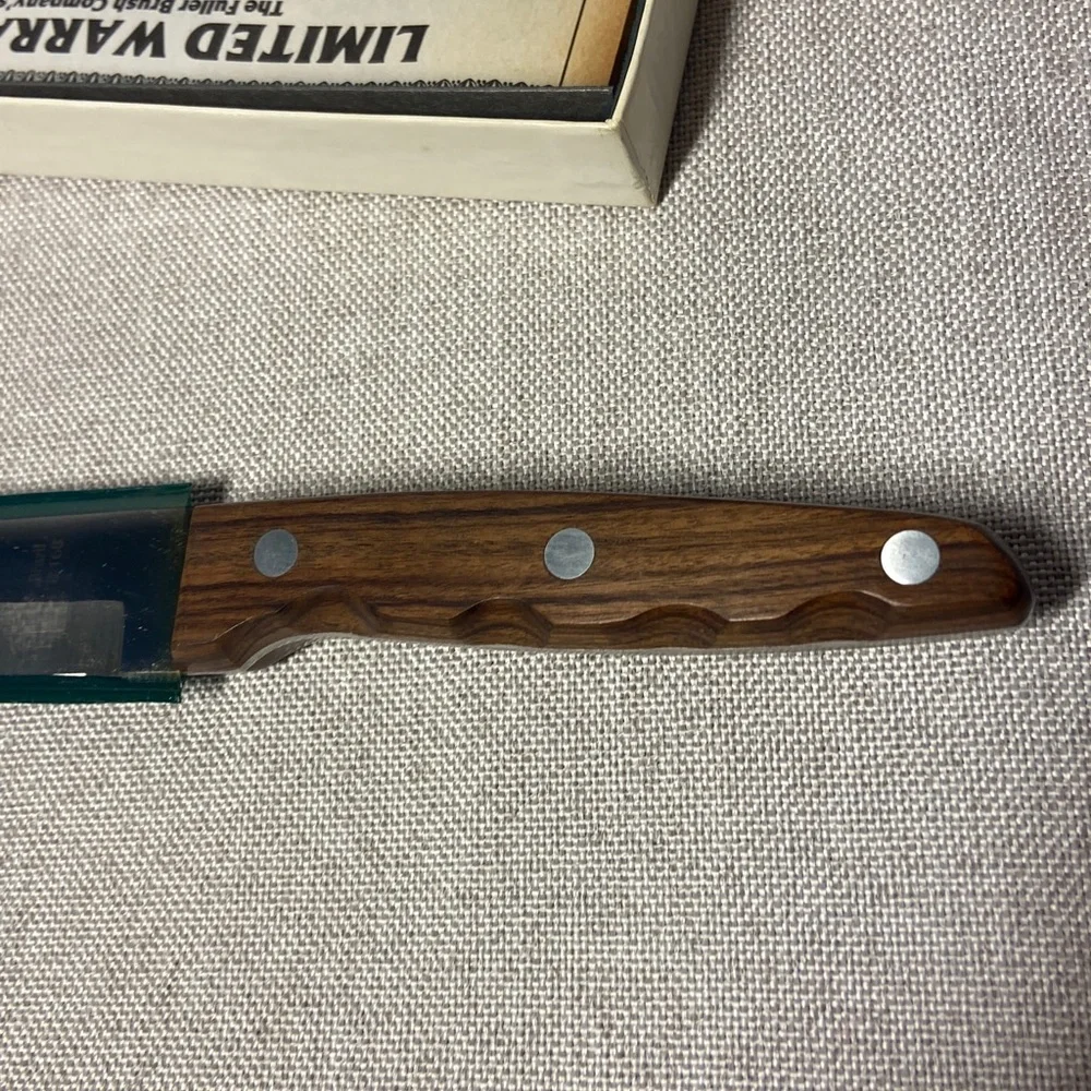 Vintage Fuller Brush Company 8” carving knife — new in original box.
